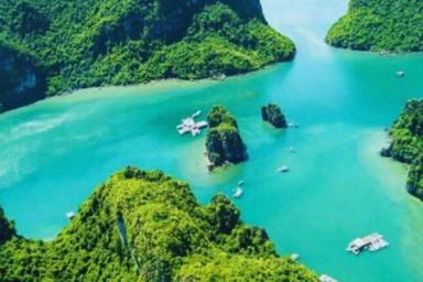 Halong Bay - Ban Chan beach - Ba Trai Dao islets (Three Peaches islets) - Ho Dong Tien (B, L, D)